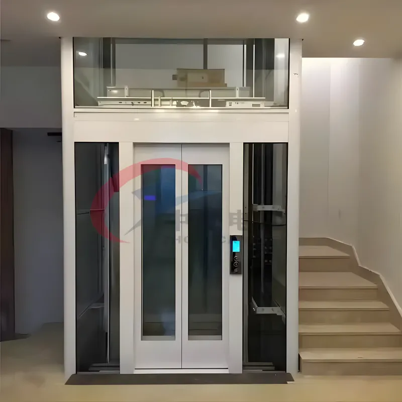 Thang máy vách kính khung trắng