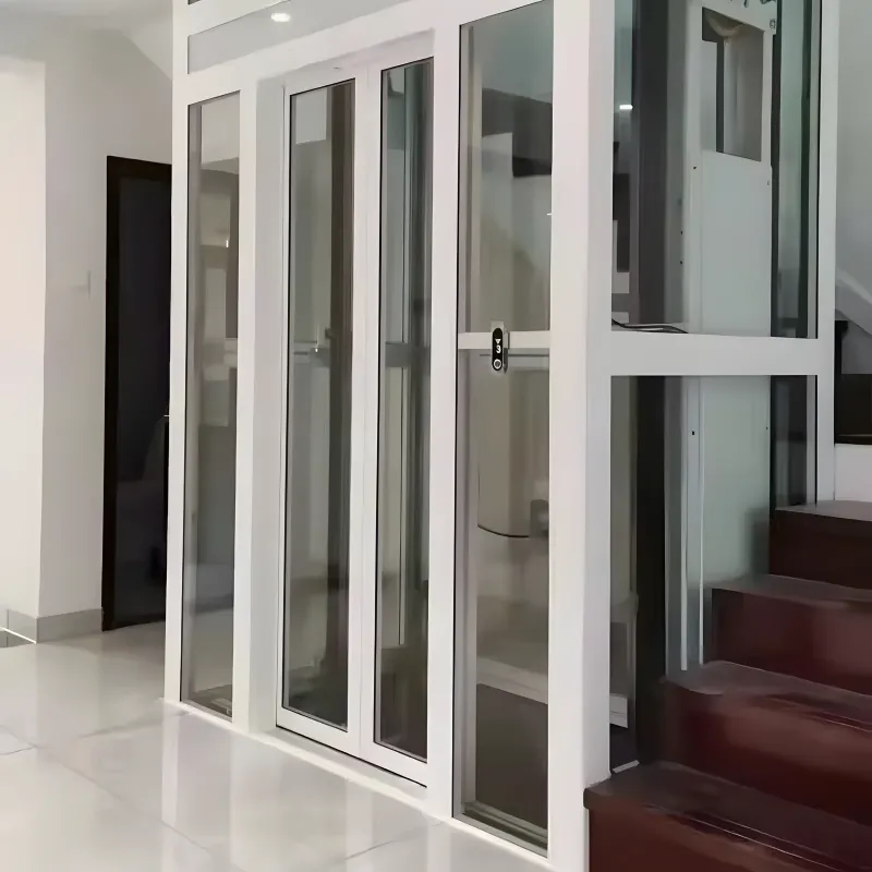 Thang máy gia đình lồng kính khung nhôm trắng sứ